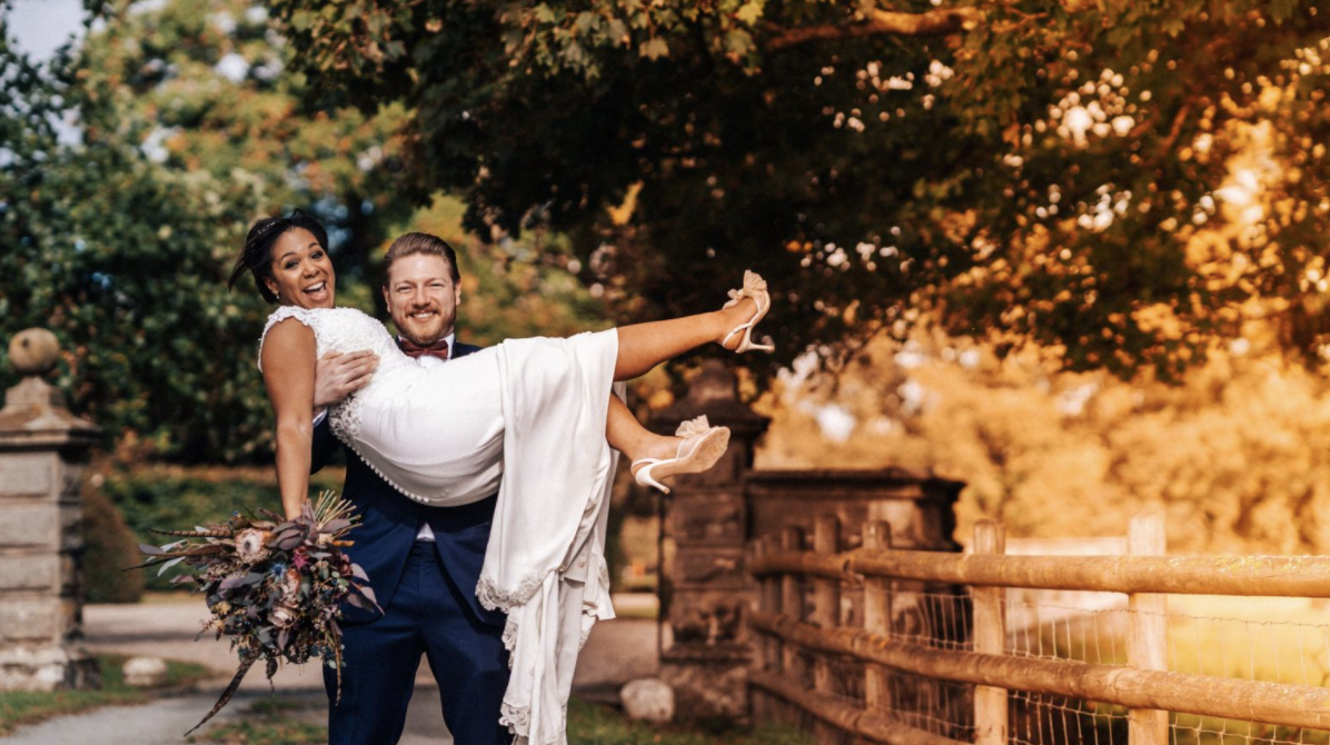 30 Works - Blog Photo of Wedding Couple - Bride in grooms arms