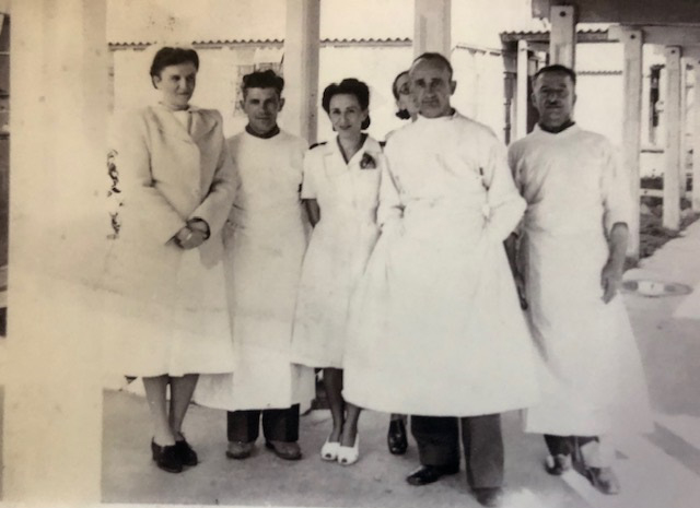 Doctors and nurses during the second world war stand posing for the camera