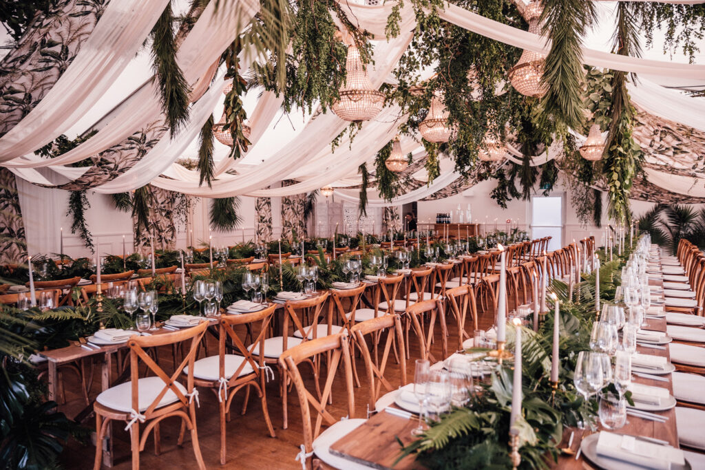 Seasonal inspiration for how to dress your wedding marquee reception space using pink, greenery, wintry, maximalist and traditional themes