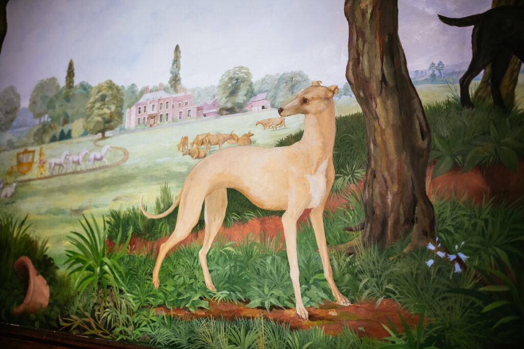 An in-depth history of the Iscoyd Park hand-painted mural presented by Philip Godsal explaining the symbolism of the Golden Coach, crests, books and pet foxes.