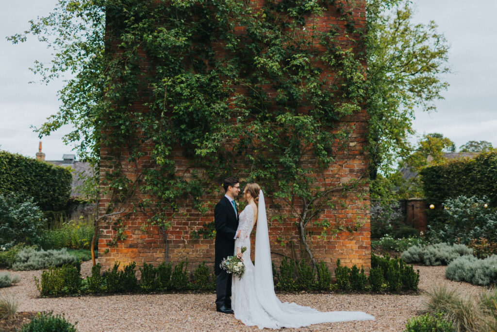 A vintage glam inspired wedding at luxury wedding venue Iscoyd Park with a Pronovias Panjin wedding dress and green Ghost bridemaids photographed by Lisa Webb Photography
