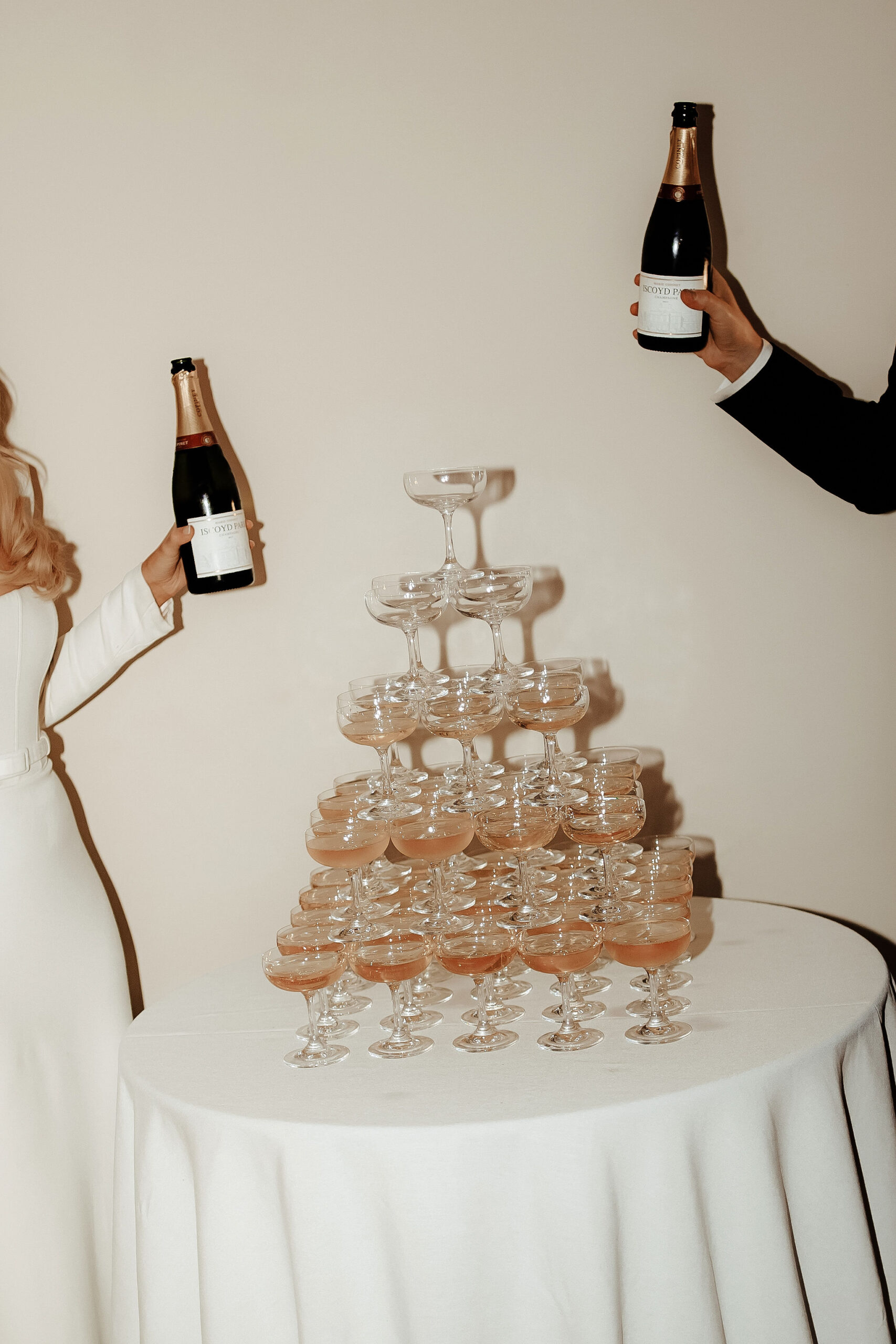 Your complete guide on how to build the best wedding champagne tower for your big day including flower ice cubes inspiration at Iscoyd Park