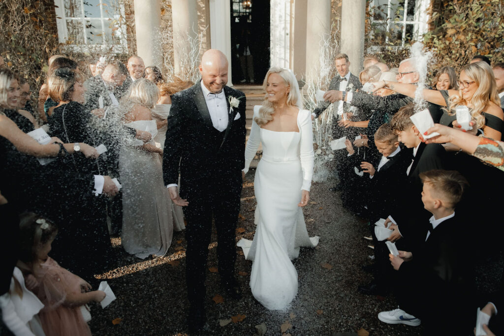 A cool neutral contemporary Winter wedding at wedding venue Iscoyd Park with Amber Suzanne Neville Bridal gown by Barbara Markiewicz Photography
