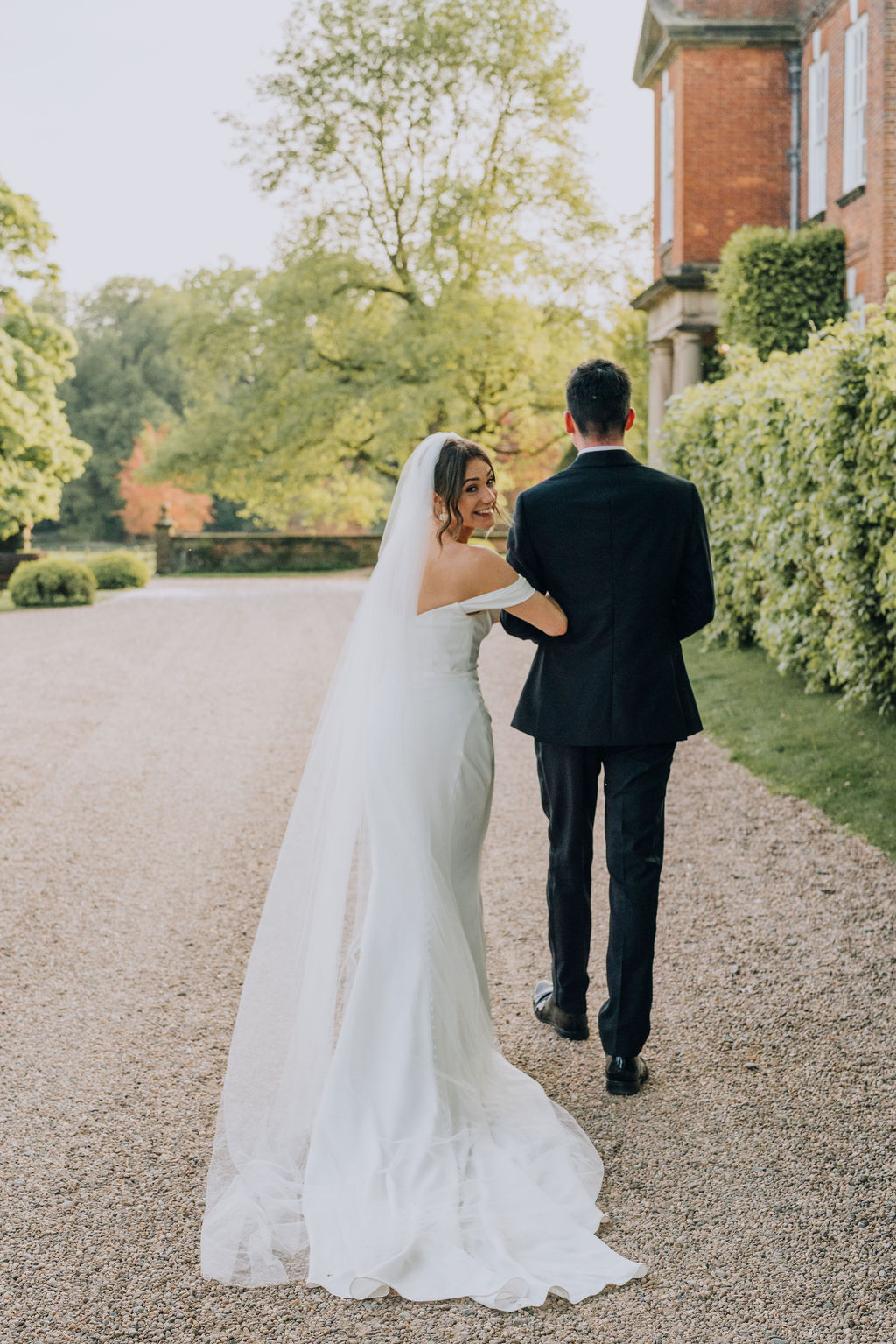 May classic English wedding at luxury venue Iscoyd Park with black tie, blush and champagne bridesmaids dresses by Clara Cooper Photography