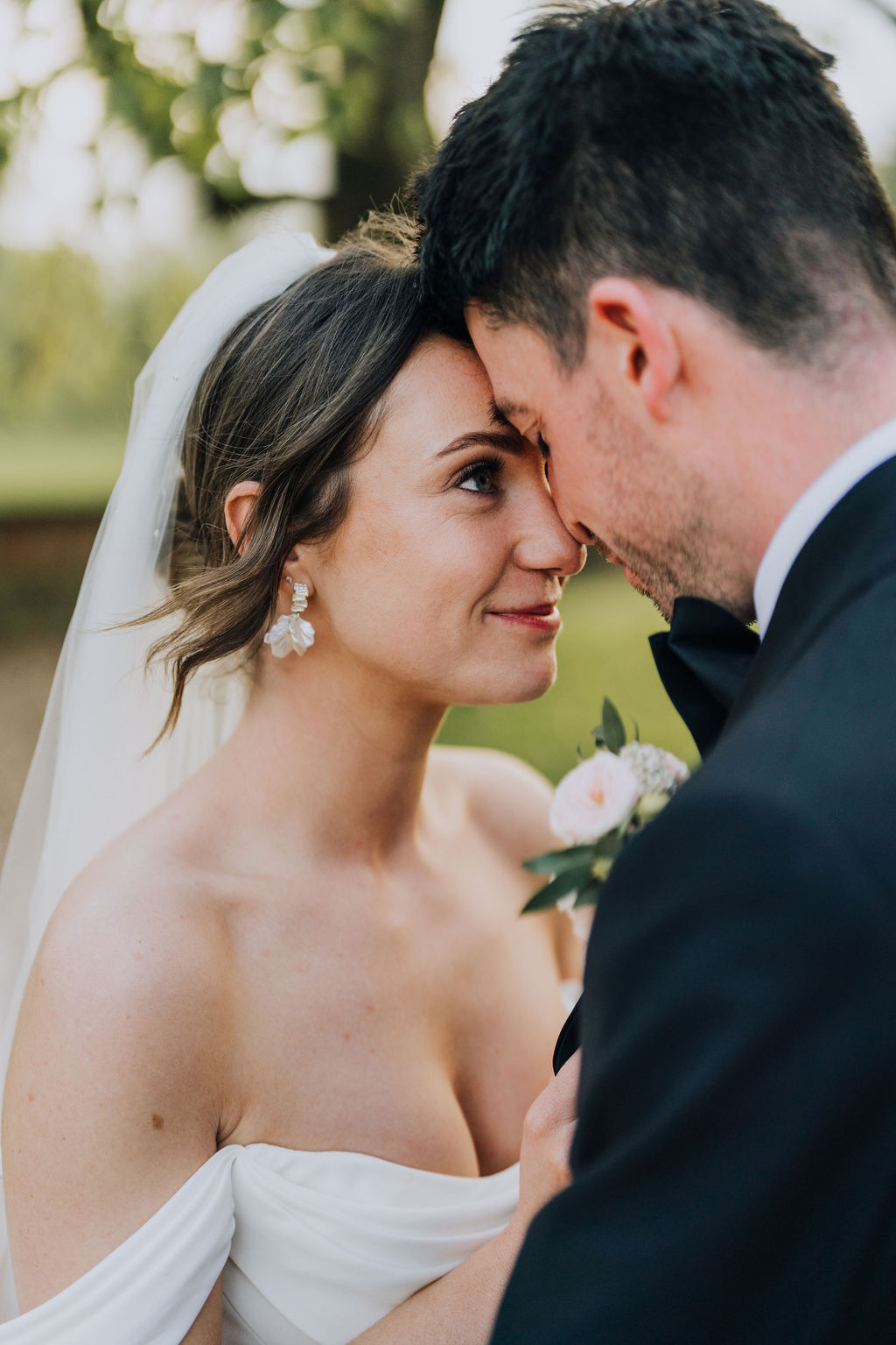 May classic English wedding at luxury venue Iscoyd Park with black tie, blush and champagne bridesmaids dresses by Clara Cooper Photography