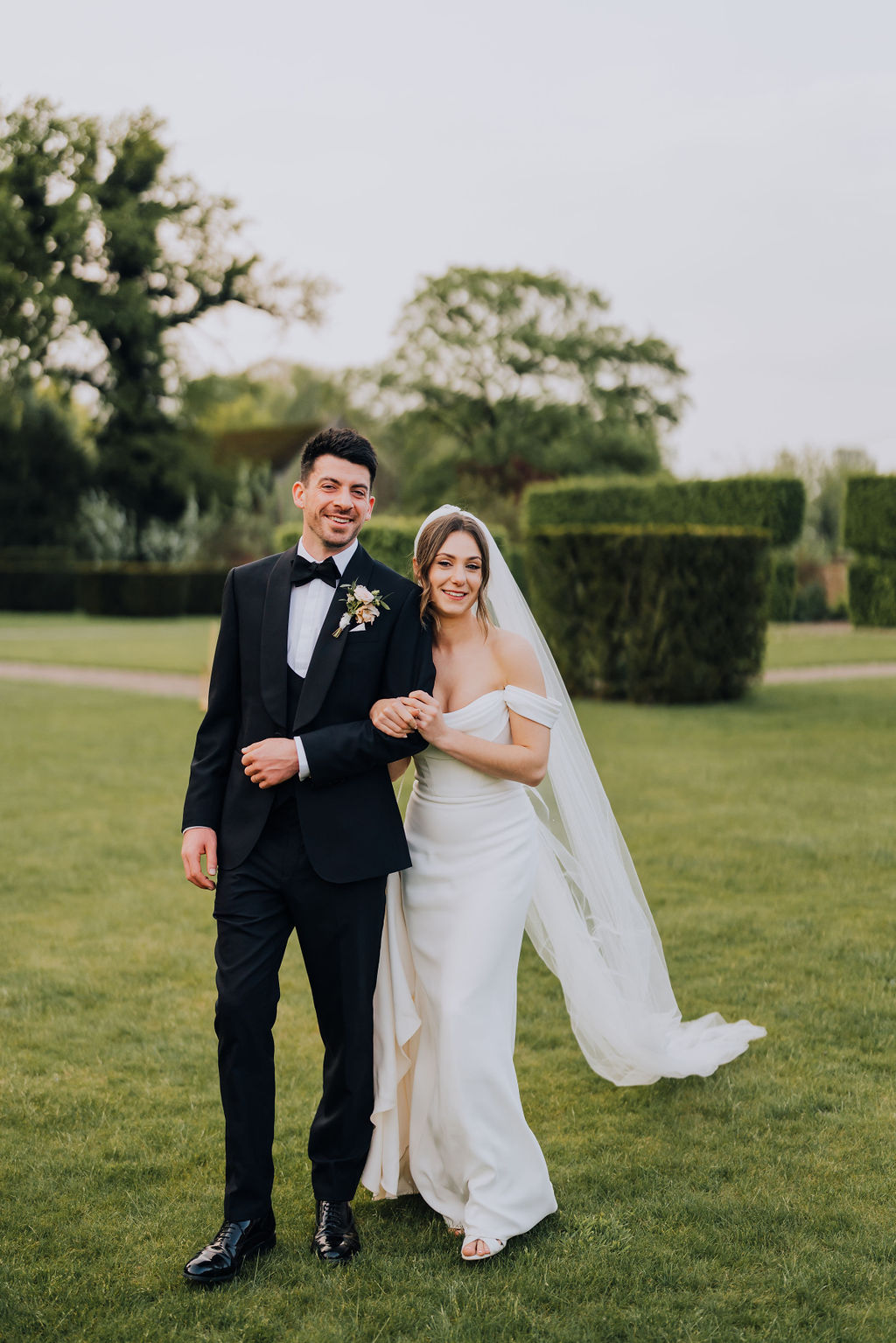 May classic English wedding at luxury venue Iscoyd Park with black tie, blush and champagne bridesmaids dresses by Clara Cooper Photography