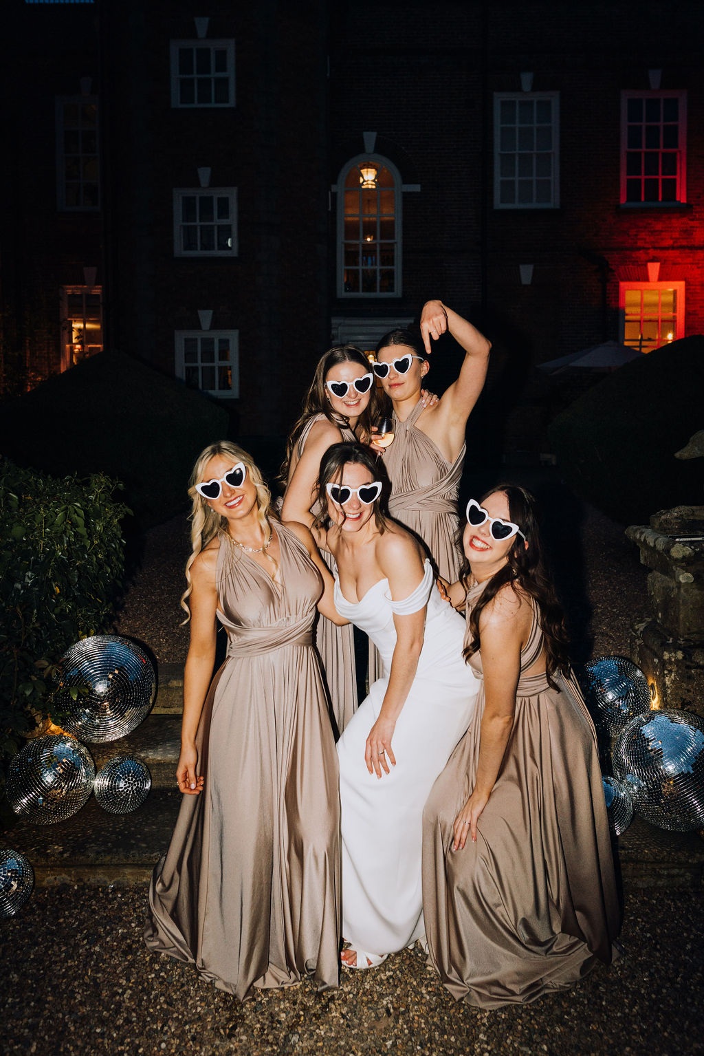 May classic English wedding at luxury venue Iscoyd Park with black tie, blush and champagne bridesmaids dresses by Clara Cooper Photography