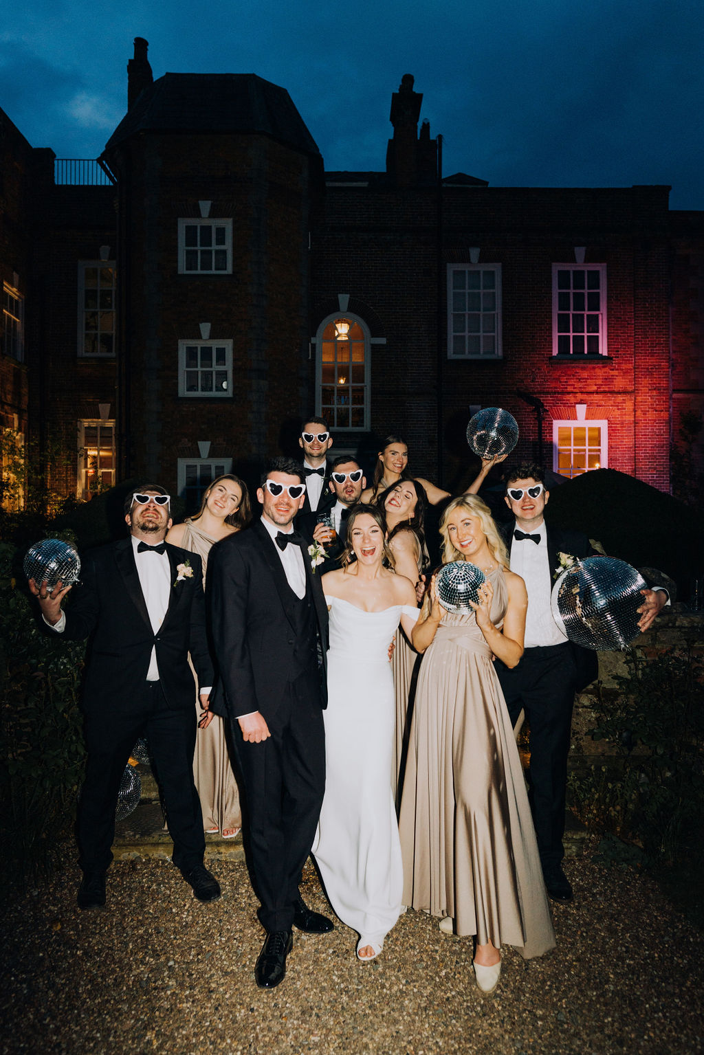 May classic English wedding at luxury venue Iscoyd Park with black tie, blush and champagne bridesmaids dresses by Clara Cooper Photography