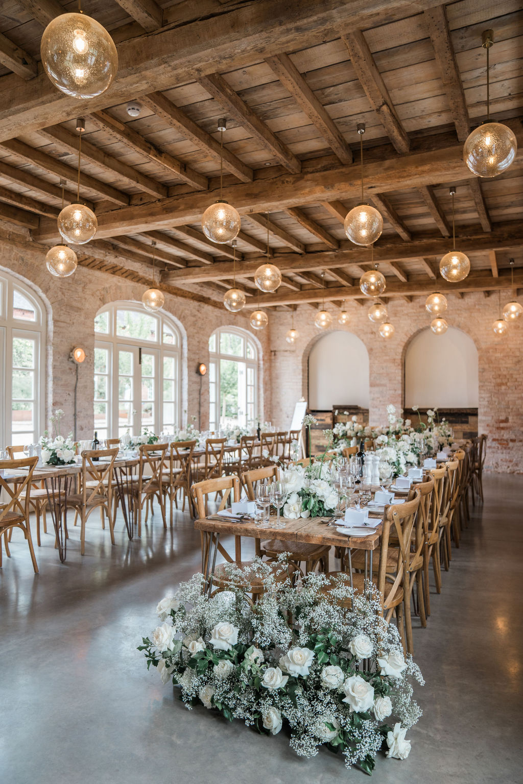 Voluptuous White Wedding Florals at a June Iscoyd Park wedding by Jessica Raphael Photography