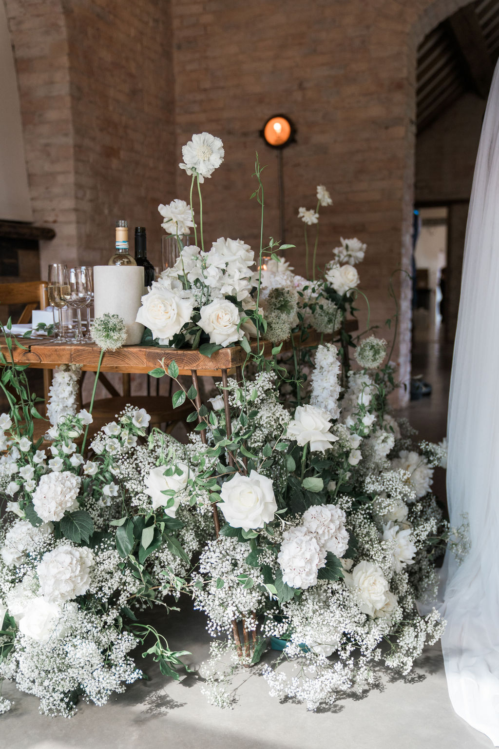 Voluptuous White Wedding Florals at a June Iscoyd Park wedding by Jessica Raphael Photography