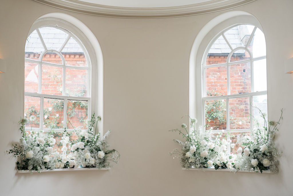 Voluptuous White Wedding Florals at a June Iscoyd Park wedding by Jessica Raphael Photography