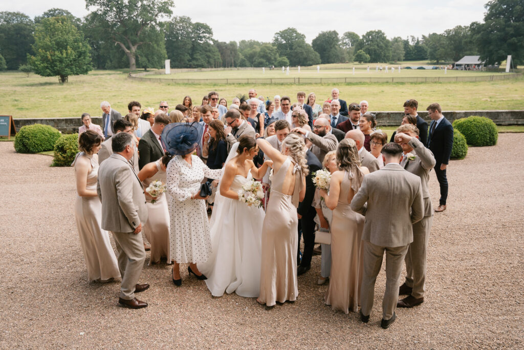 Toffee and mocha coloured themed classic summer wedding at luxury venue Iscoyd Park with oversized bow dress by Toria Frances Photography
