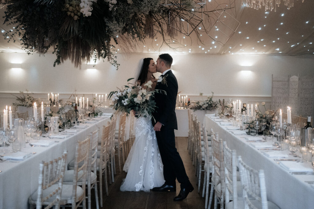 A New Year showstopper luxury wedding at Iscoyd Park with white bridesmaid dresses and extravagant florals by Courtney Marie Photography.