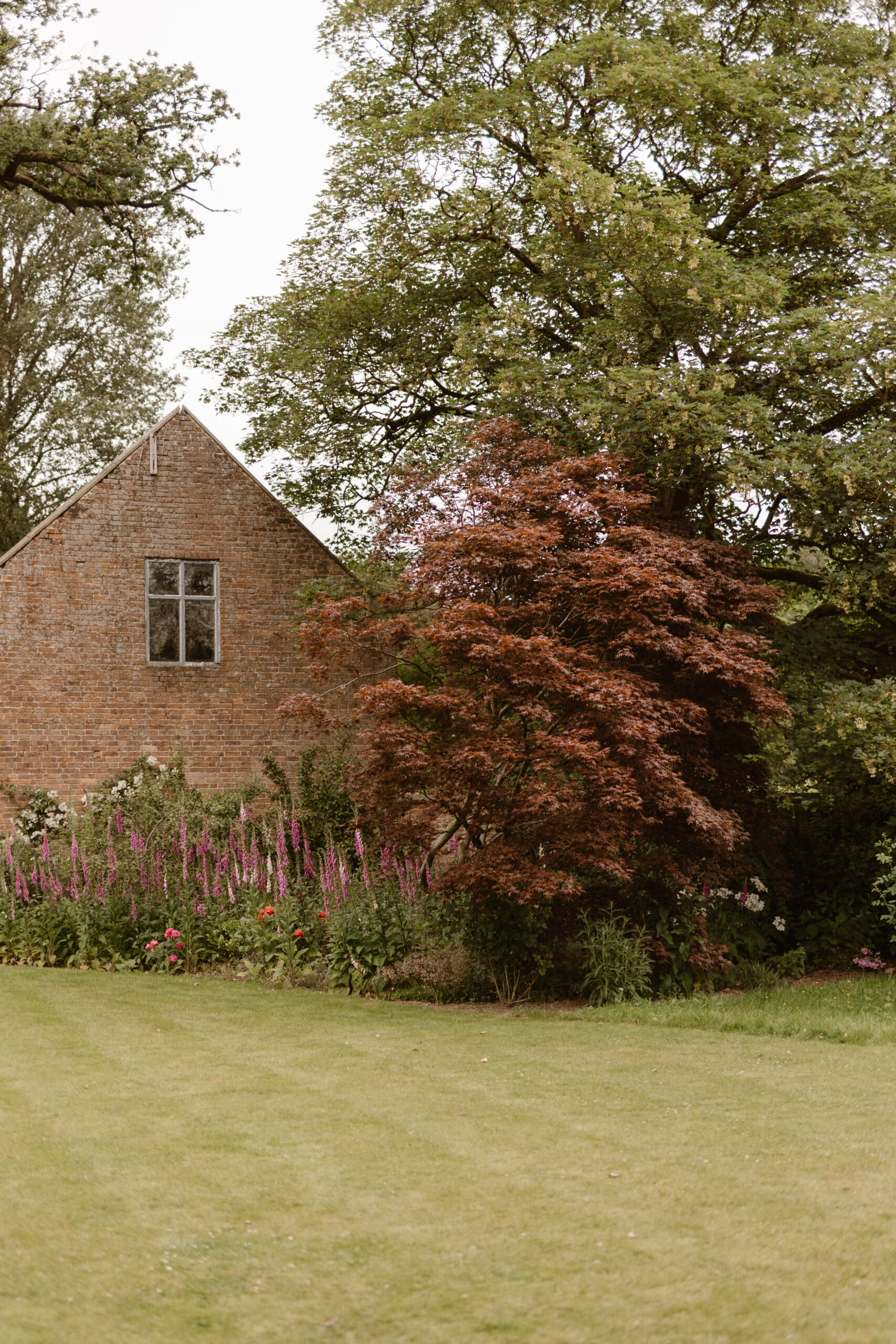 Soft peach meadow inspired Summer wedding at Iscoyd Park by Agnes Black Photography.