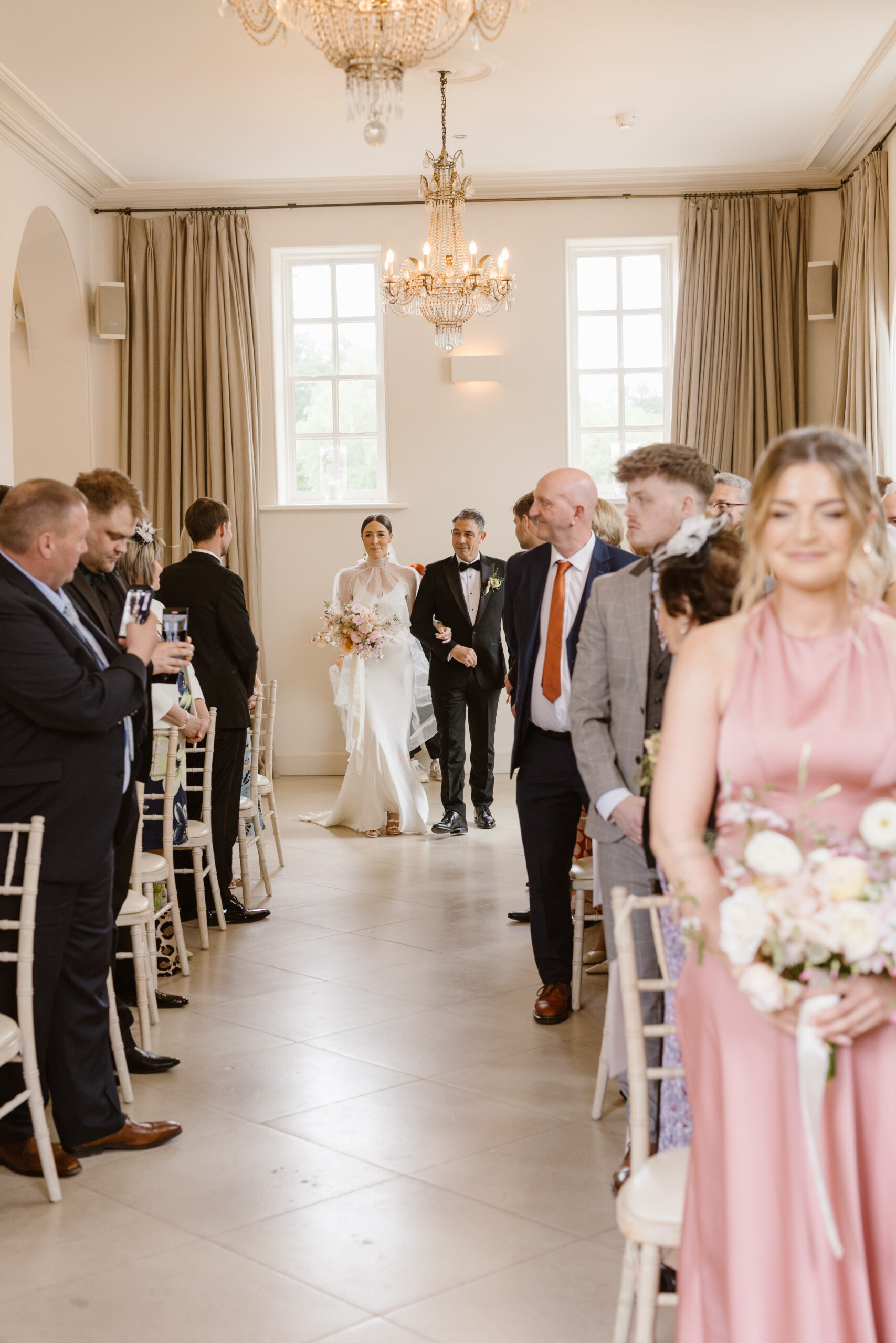 Soft peach meadow inspired Summer wedding at Iscoyd Park by Agnes Black Photography.