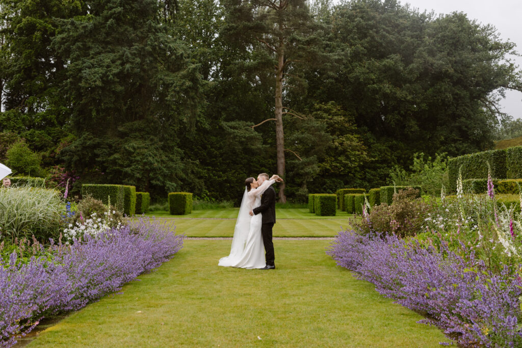Soft pink and peaches meadow inspired Summer wedding with Harriette Gordon organza gown at Iscoyd Park by Agnes Black Photography.