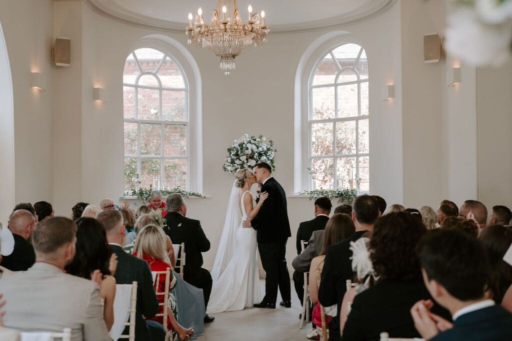 Summer powder blue and black tie wedding at luxury wedding venue Iscoyd Park with s'mores and rose bouquets by Lauren Juliette Photography.