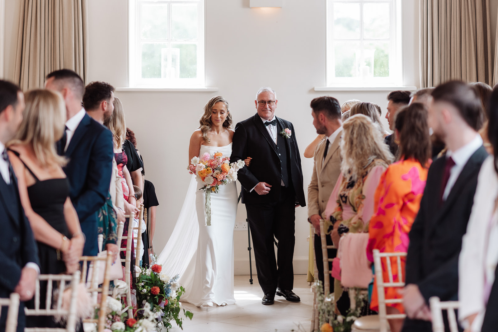 Check out this colour pop modern luxe wedding with coral florals at Iscoyd Park by Lucy Henzell Photography