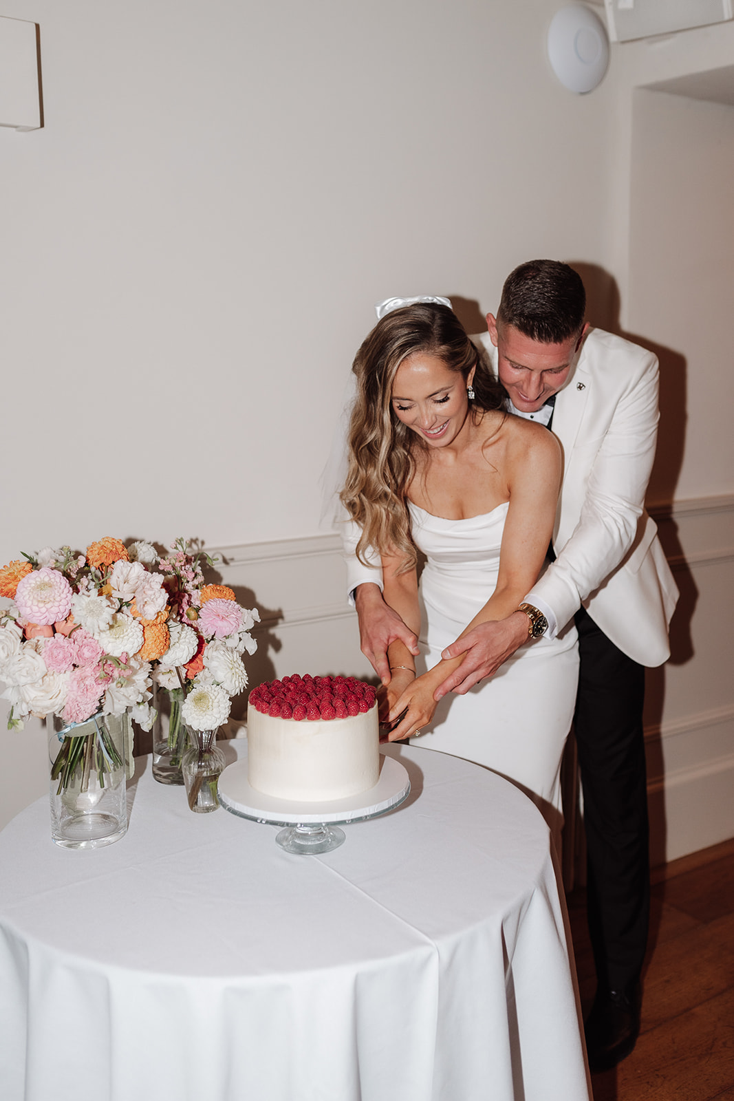 Check out this colour pop modern luxe wedding with coral florals at Iscoyd Park by Lucy Henzell Photography