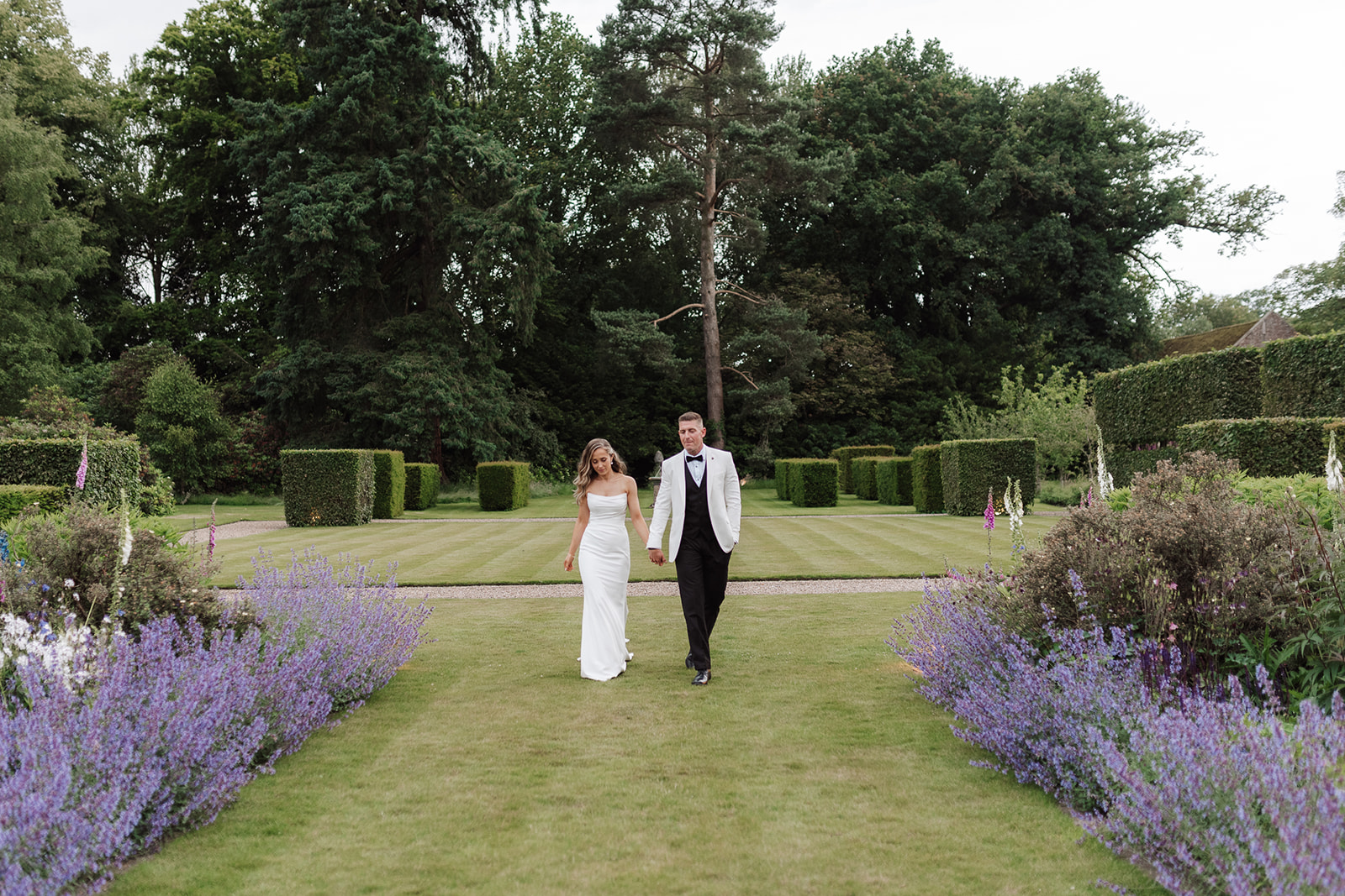 Check out this colour pop modern luxe wedding with coral florals at Iscoyd Park by Lucy Henzell Photography