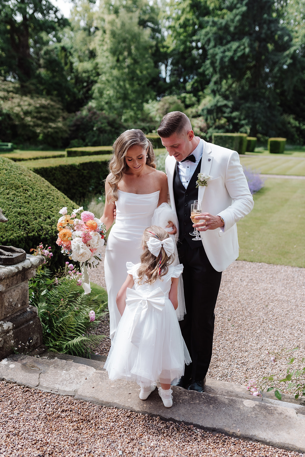 Check out this colour pop modern luxe wedding with coral florals at Iscoyd Park by Lucy Henzell Photography