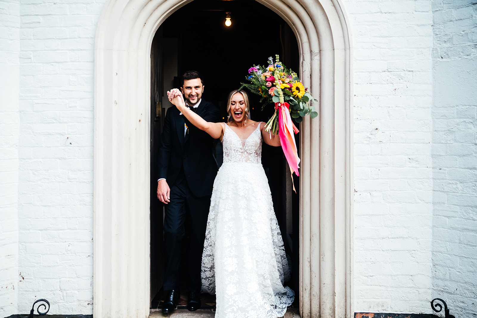 Colour pop juicy fruit wedding at luxury UK venue Iscoyd Park by Hannah Hall Photography.