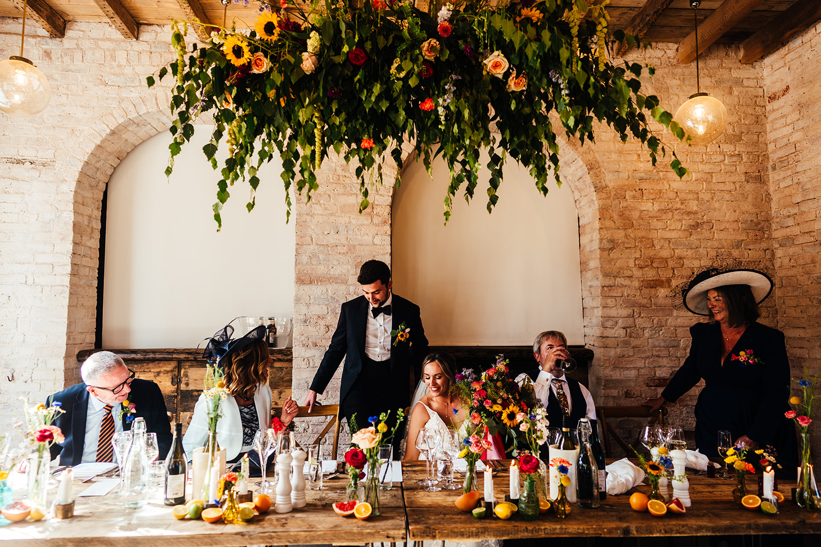 Colour pop juicy fruit wedding at luxury UK venue Iscoyd Park by Hannah Hall Photography.