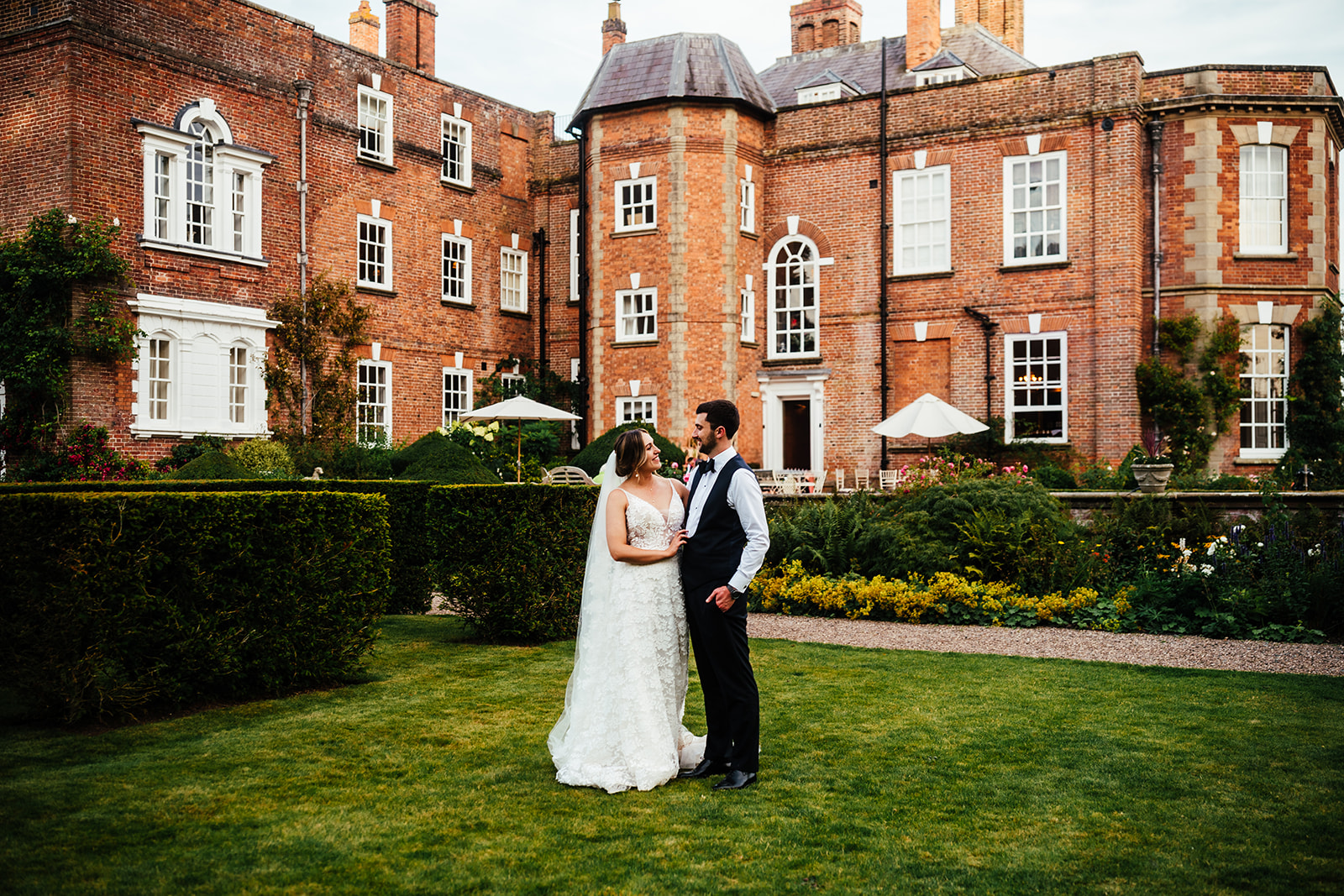 Colour pop juicy fruit wedding at luxury UK venue Iscoyd Park by Hannah Hall Photography.