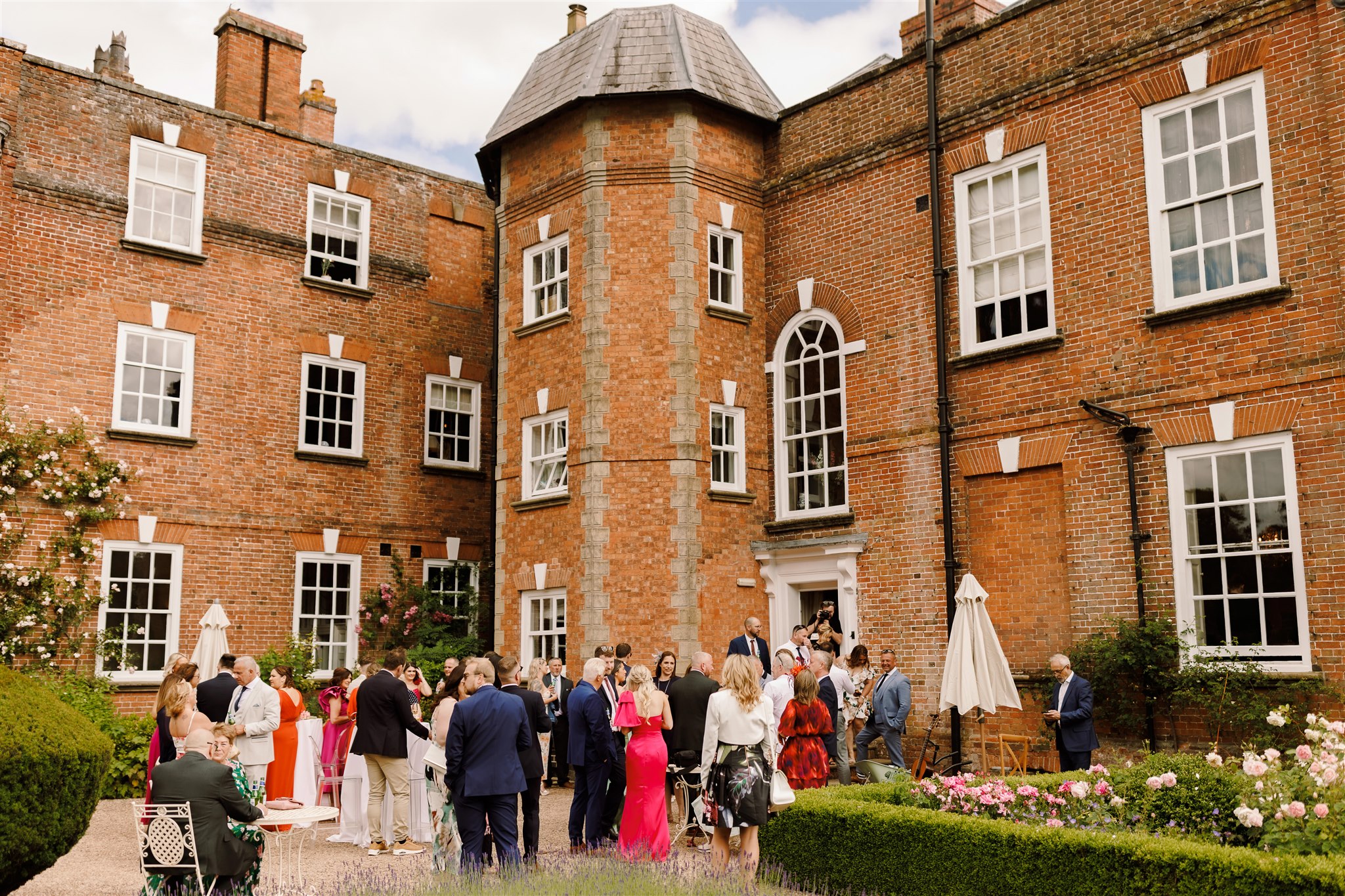 Red hot red romance at Iscoyd Park with an outdoor summer wedding at this exclusive venue