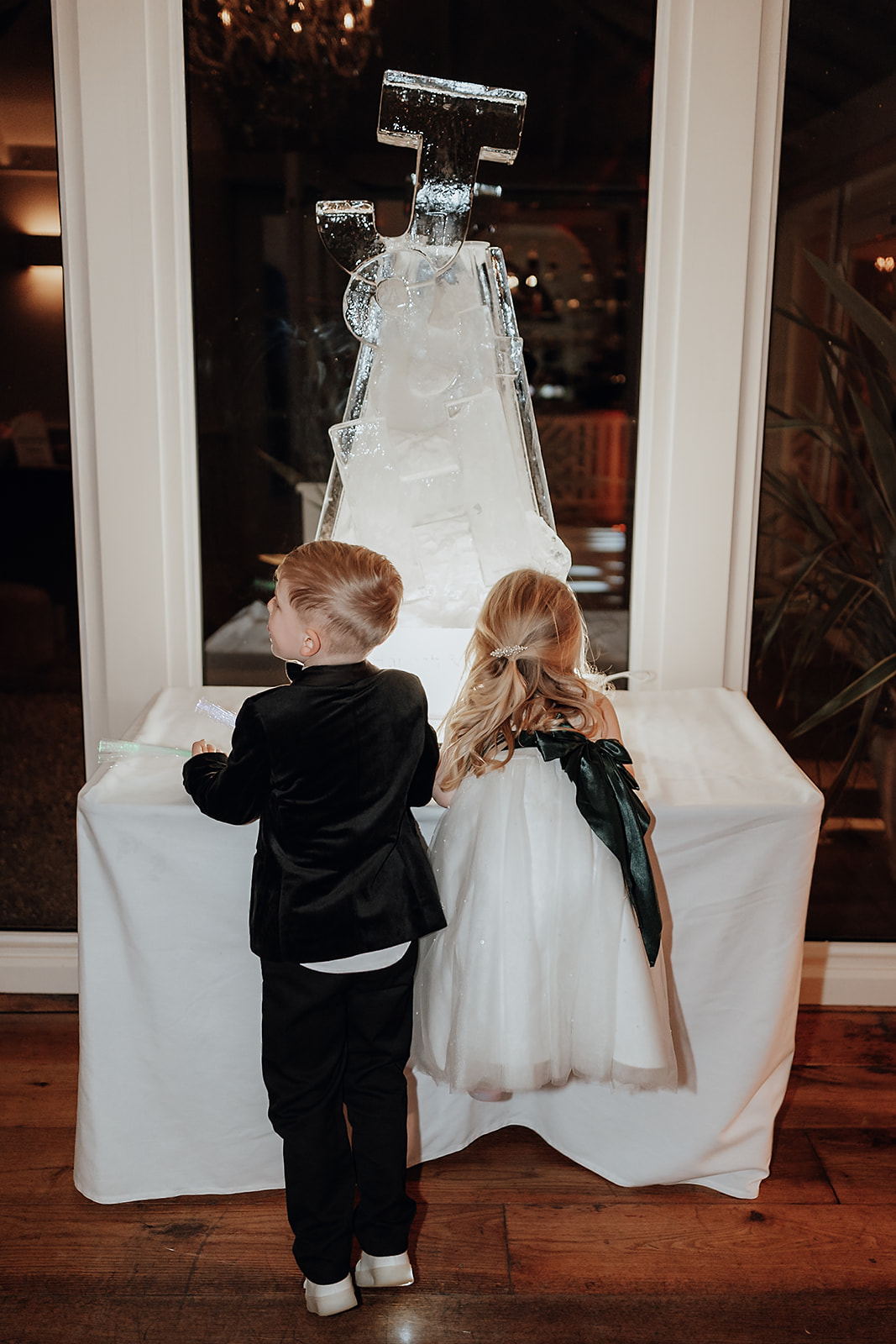 Ice luges, customised cocktails and flower clouds reign supreme at this New Year's Eve wedding at Iscoyd Park by Patrick Partridge Photography