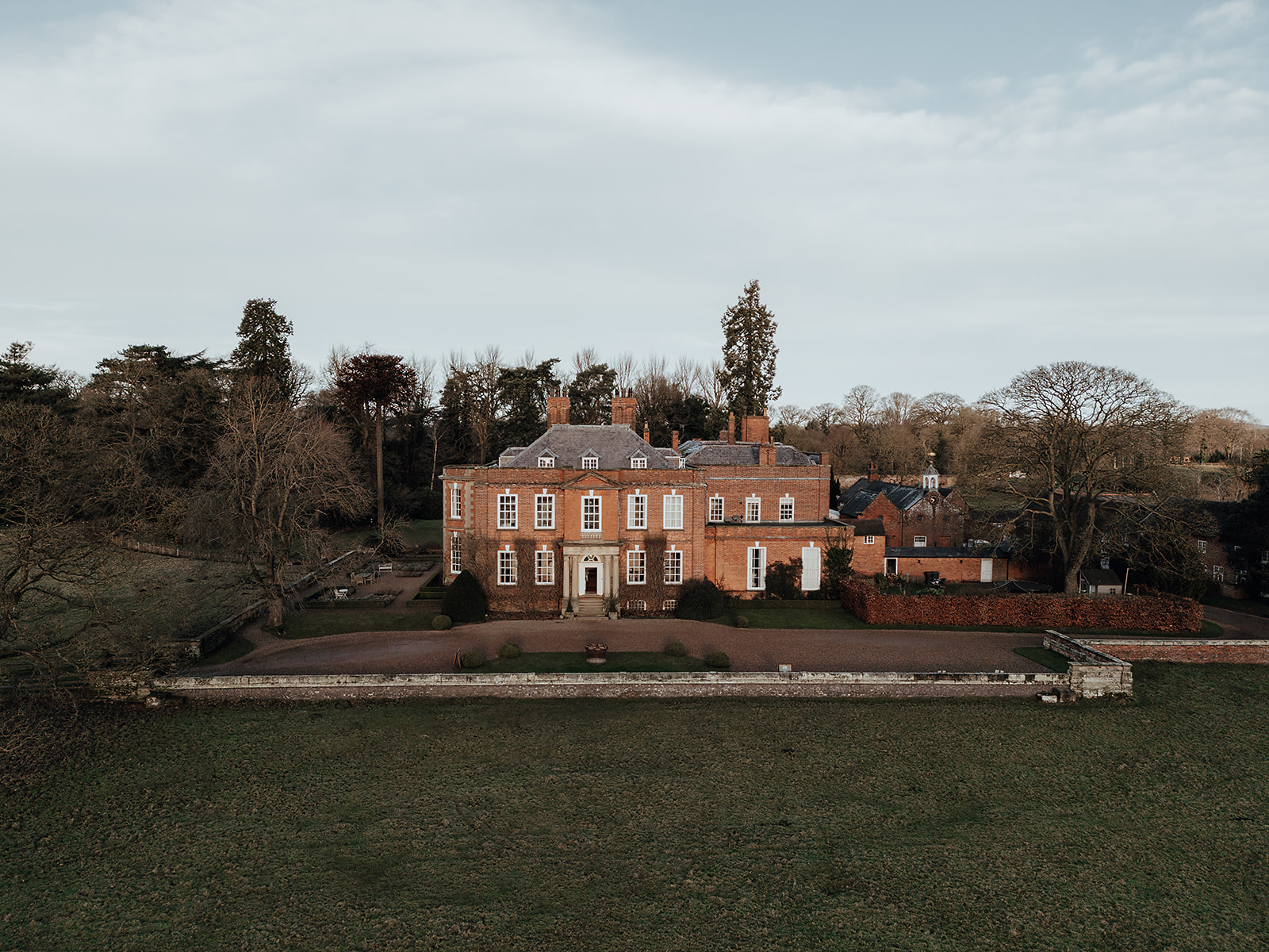Ice luges, customised cocktails and flower clouds reign supreme at this New Year's Eve wedding at Iscoyd Park by Patrick Partridge Photography